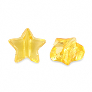 Abalorios acr&iacute;licos estrella Transparente amarillo spectra