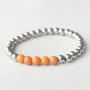 Pulseras y pendientes con fornituras de acero inoxidable 