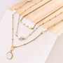 Elaboraci&oacute;n de joyas minimalistas con perlas de agua dulce y fornituras para pendiente base doradas