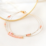 Elegantes pendientes y pulseras con los abalorios faceteados cubo