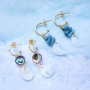 Crea un look veraniego de joyer&iacute;a con los nuevos colgantes de concha