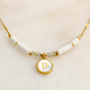 Cree joyer&iacute;a personalizada con colgantes de acero inoxidable y concha