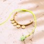 As&iacute; se incorporan las borlas a pulseras y cordones para gafas de sol