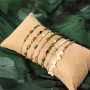  Crea bella joyer&iacute;a con abalorios de cristal con borde dorado