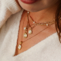 Ideas creativas con colgantes de acero inoxidable y concha para crear joyas