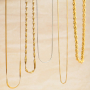 Combina collares y pulseras de acero inoxidable