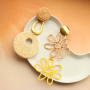 Dise&ntilde;a collares, pendientes y anillos con colgantes y fornituras de rafia