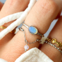 Elegantes anillos de acero inoxidable con piedra natural