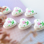 Crea llamativas joyas con perlas de imitaci&oacute;n pintadas a mano