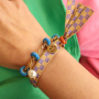 Crea coloridas pulseras con abalorios de cierre deslizante con esmalte