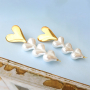 Crear joyas elegantes con perlas de agua dulce de imitaci&oacute;n