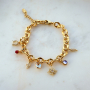 Crea collares y pulseras elegantes con colgantes y entrepiezas de lat&oacute;n TQ