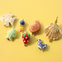 Crea colgantes con bastones de cabeza BY31&reg; y alicates 1-Step Looper